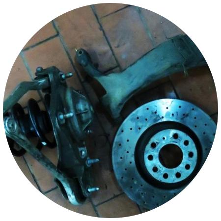 стойка амортизатора с тормозным диском