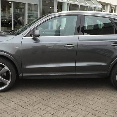 серый компактный кроссовер ауди