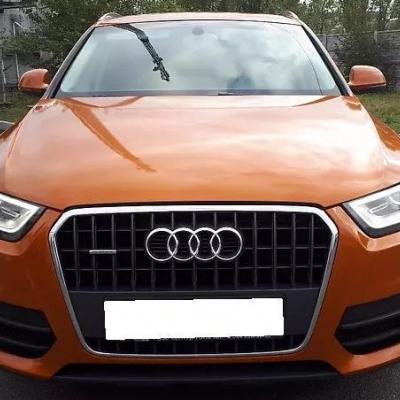 оранжевая Ауди Ку 3 спереди
